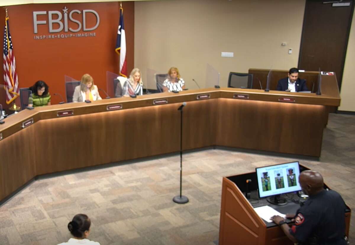 Trustees at the start of a Fort Bend Independent School District school board meeting on July 25, 2022.