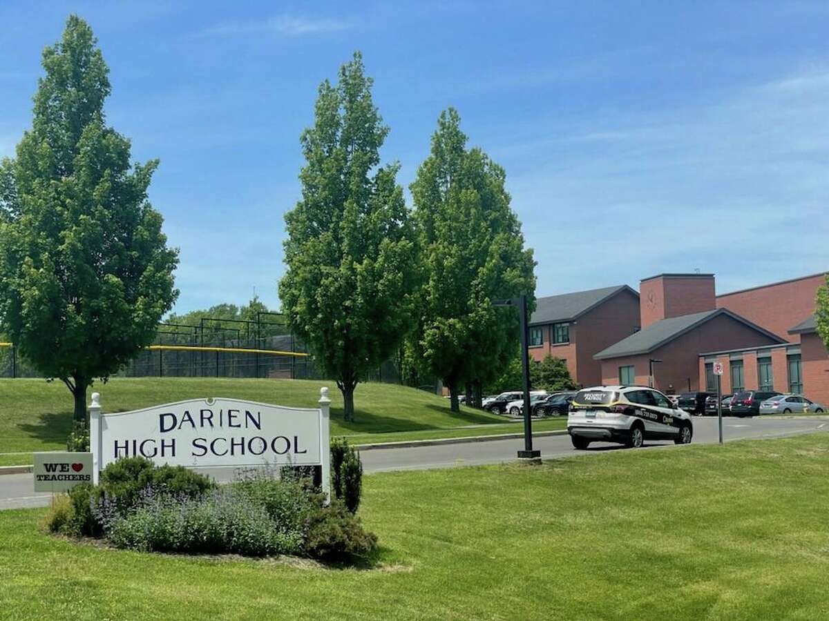 Darien High School, exterior with sign, photographed on Wednesday, May 25, 2022.