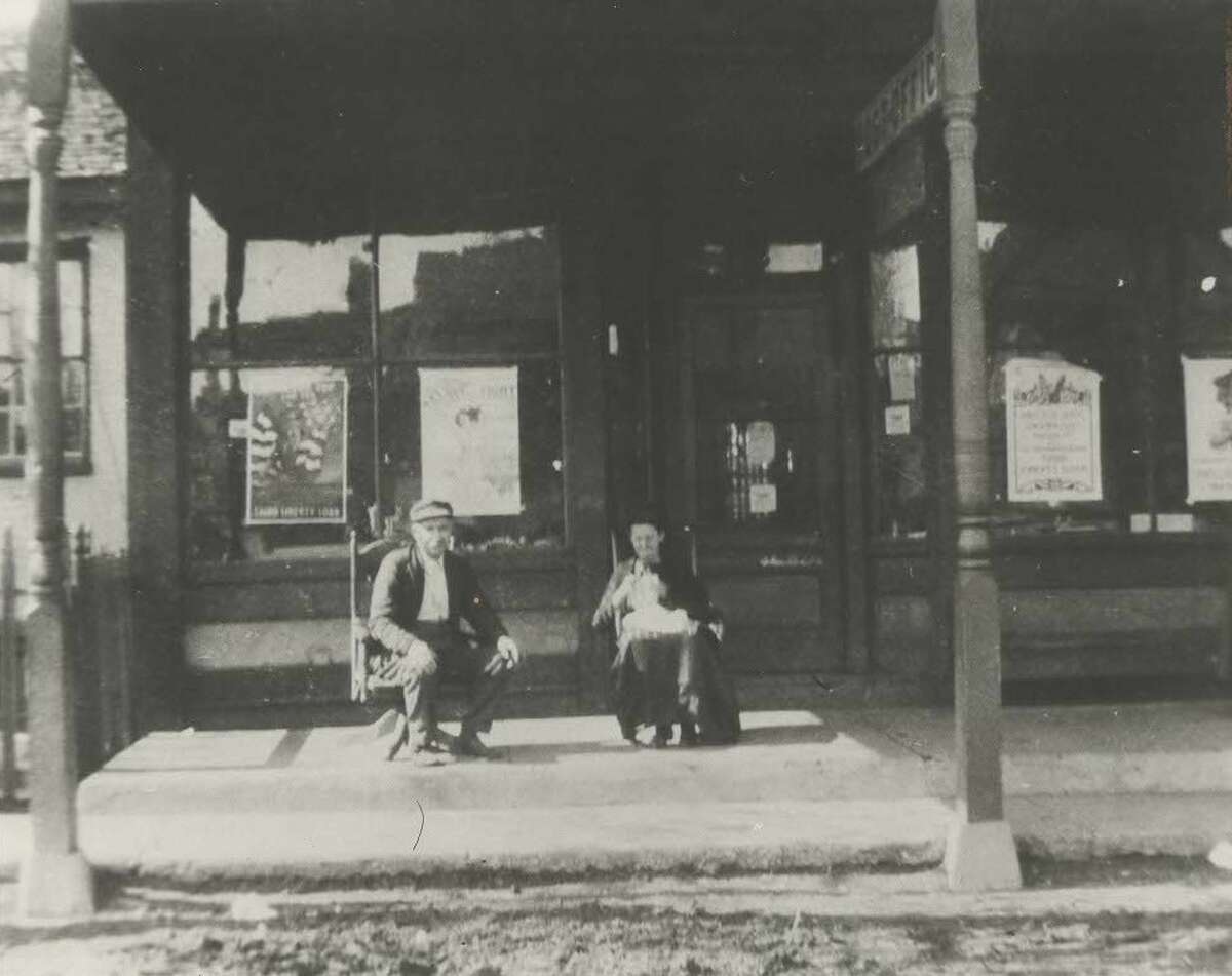 Zimmermann and his wife Lida in front of the Zimmermann Mercantile Building (which was also the post office).