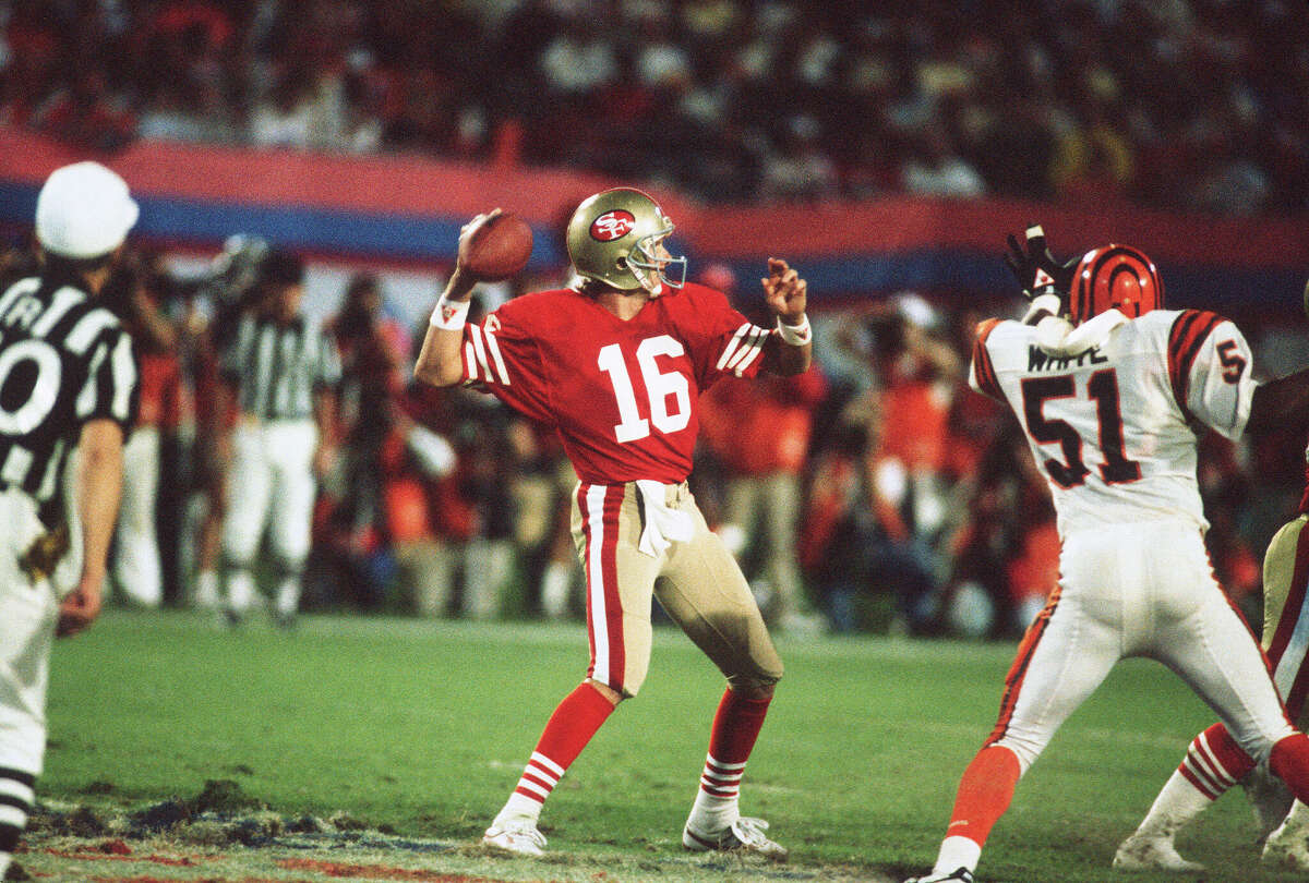 Joe Montana of the San Francisco 49ers looks to throw a pass against the Cincinnati Bengals during Super Bowl XXIII on January 22, 1989 in Miami, Florida. The 49ers won the Super Bowl 20-16.