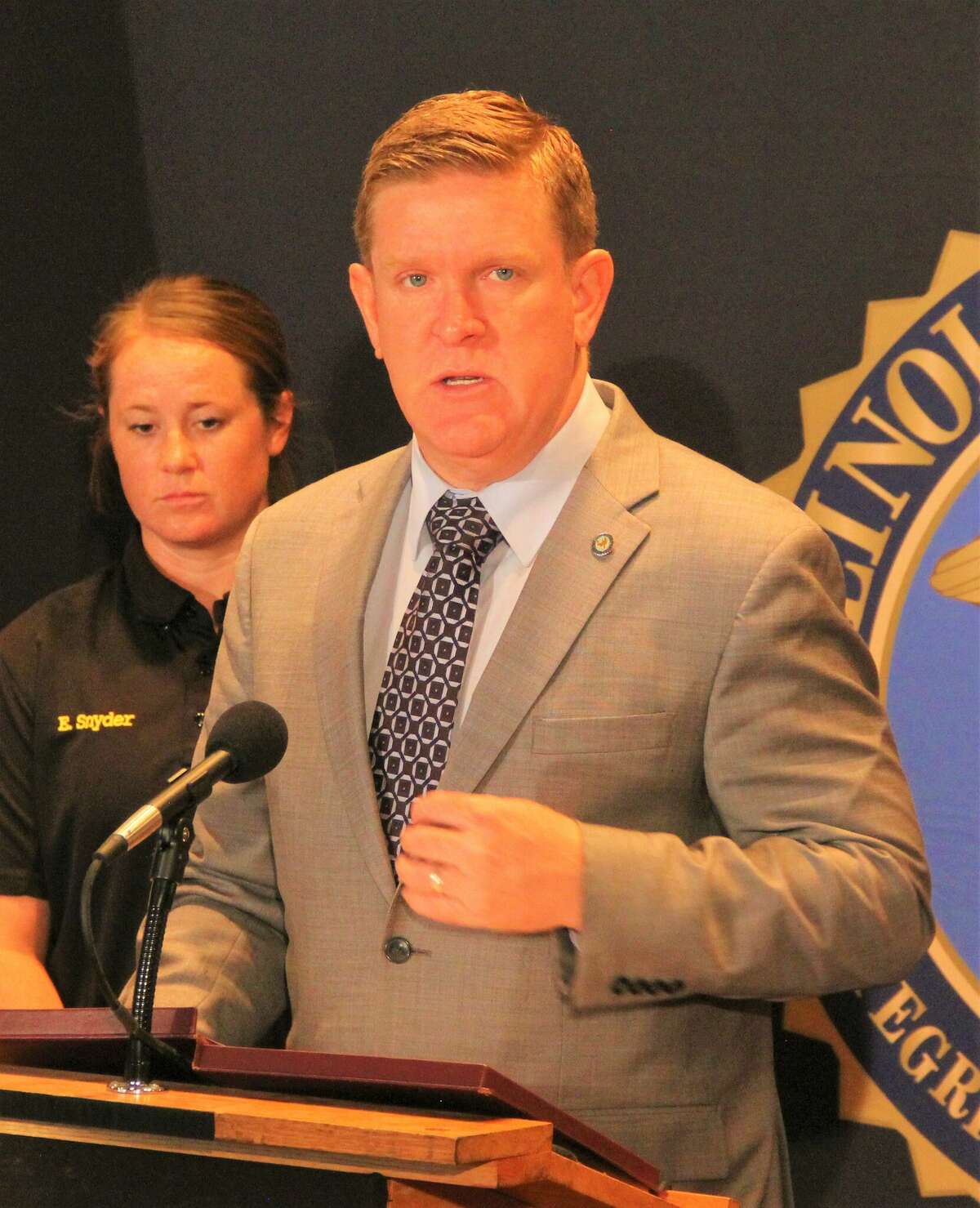 Illinois State Police Director Brendan F. Kelly talks to the media about recent firearm enforcement details held across the state during a visit to the ISP regional headquarters in Collinsville.