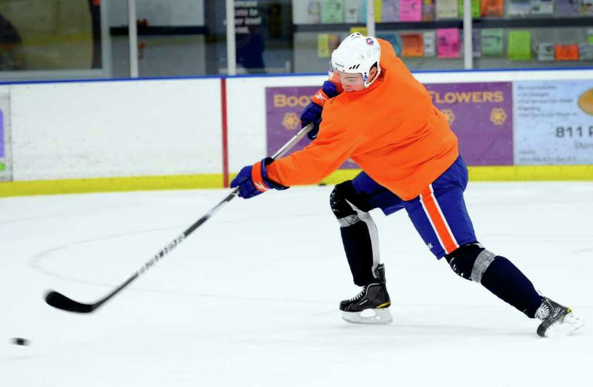 Jesse Joensuu slings the puck down the ice during Sound Tigers practice Wednesday Oct. 6, 2010 at The Rinks at SportsCenter of Connecticut in Shelton.