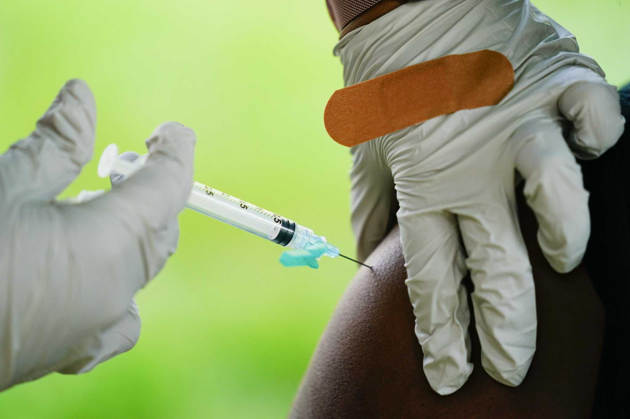 Should I get a COVID booster now or wait for new vaccine for omicron variant? - Vimarsana News