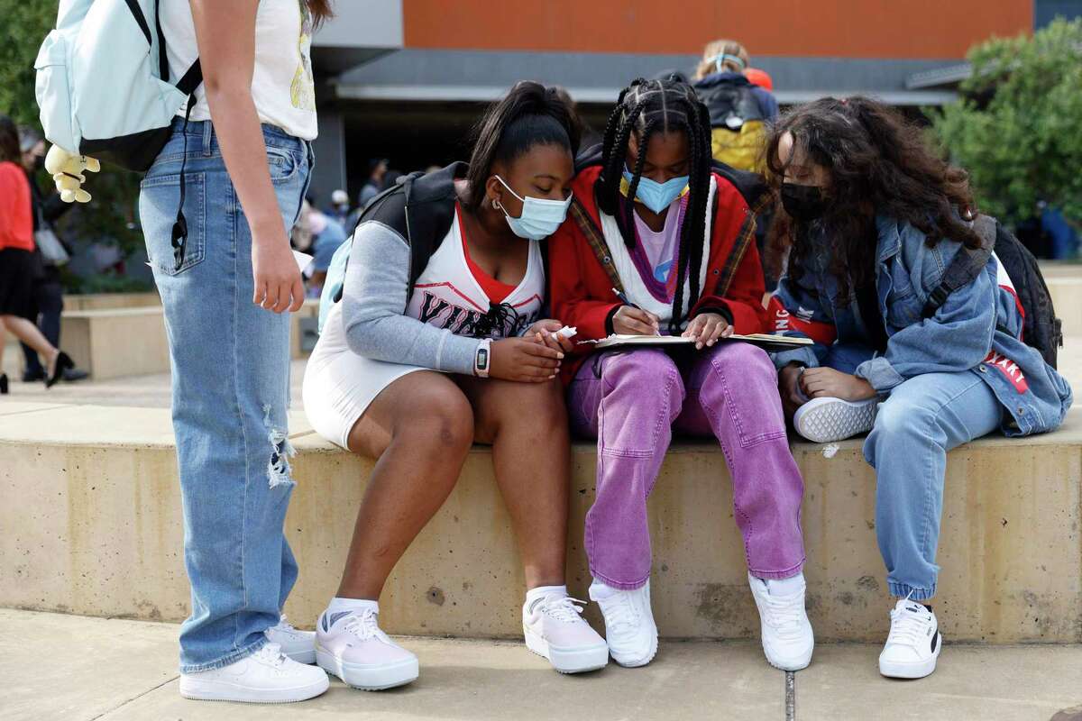 A group of seventh grade girls gather to sketch in a notebook on their first day of school at Willie Brown Jr. Middle School in San Francisco, Calif. Wednesday, Aug. 17, 2022.