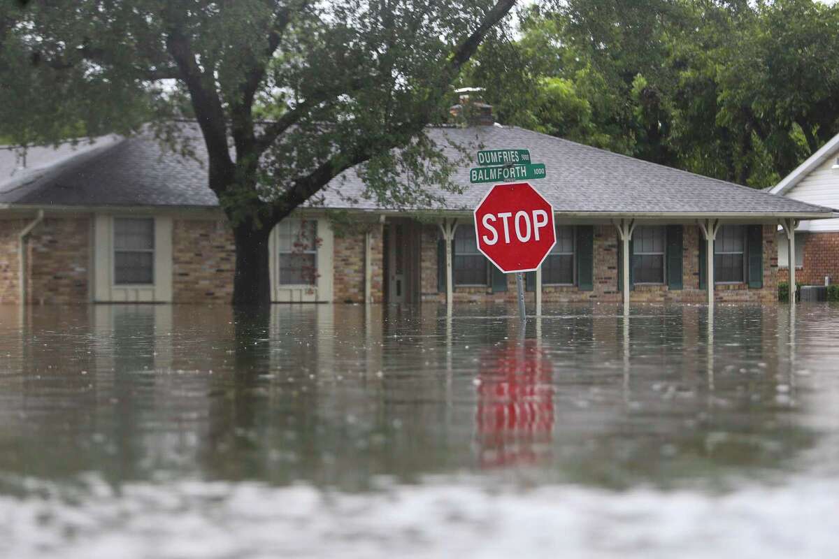 The streets of Meyerland are full of water, Sunday, Aug. 27, 2017, in Houston.