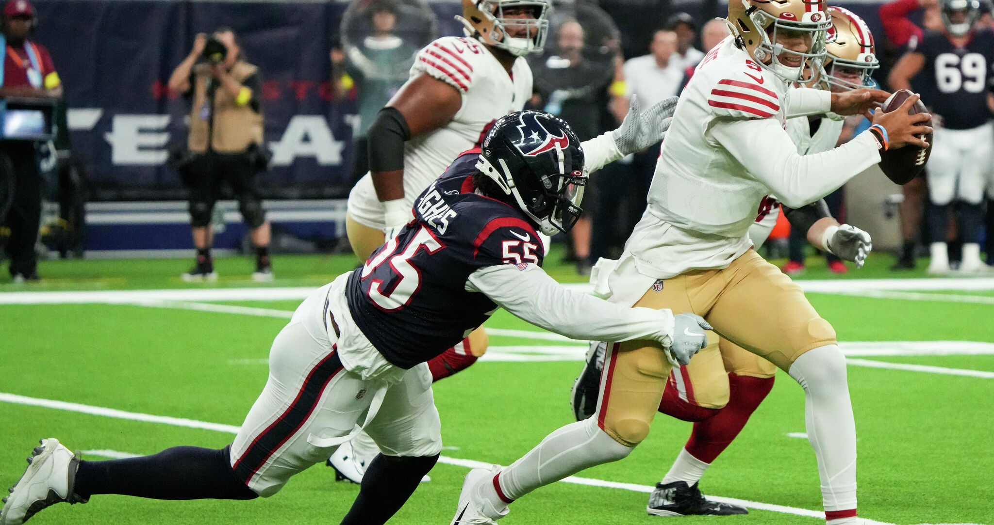 Houston Texans defensive lineman Rasheem Green (92) lines up for