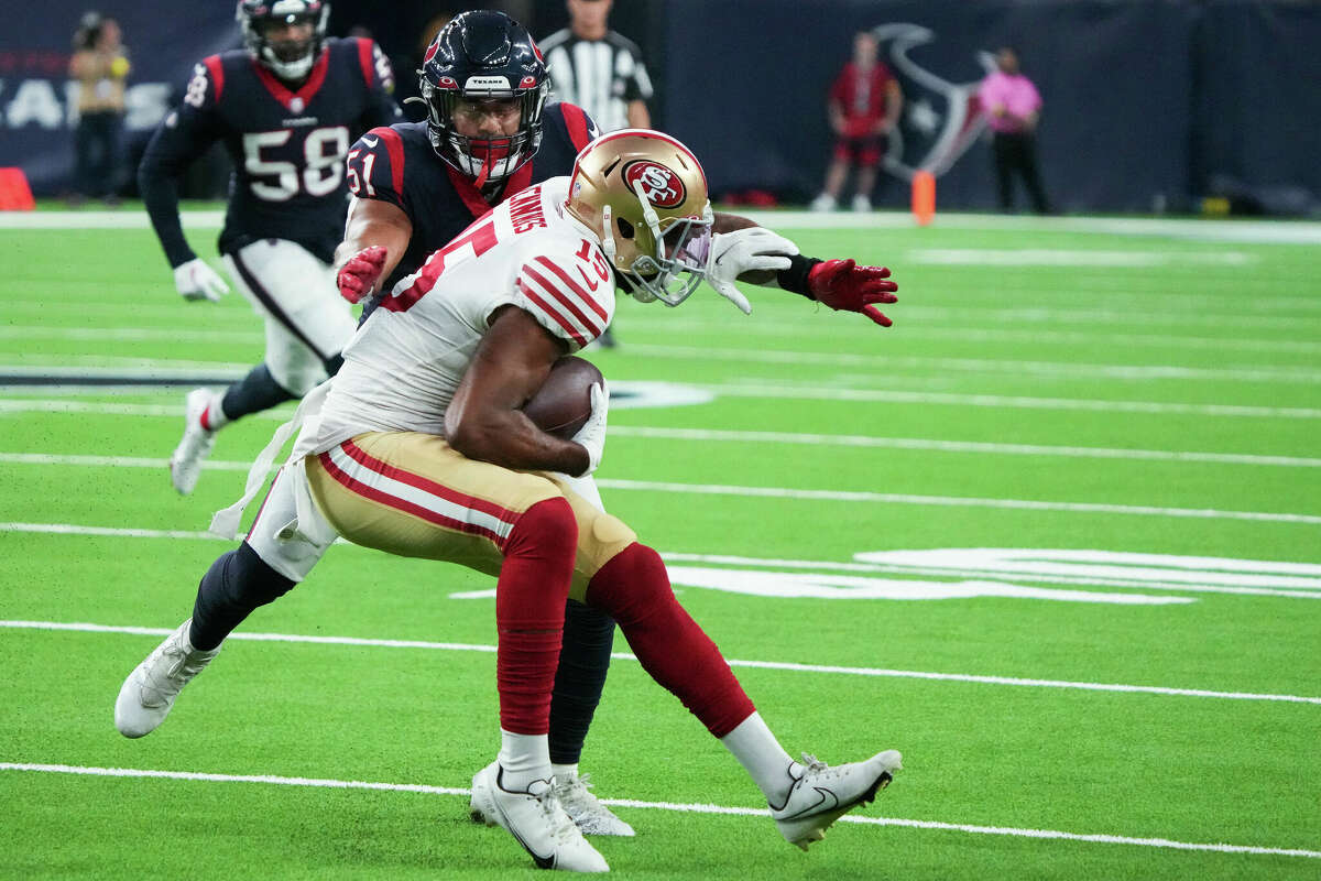 San Francisco 49ers linebacker Segun Olubi (49) looks on during