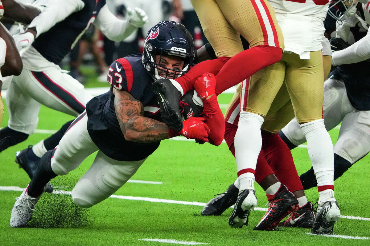 Houston Texans linebacker Blake Cashman (53) stops San Francisco 49ers wide receiver Ray-Ray McCloud III on the opening kickoff during the first half of an NFL football game Thursday, Aug. 25, 2022, in Houston.