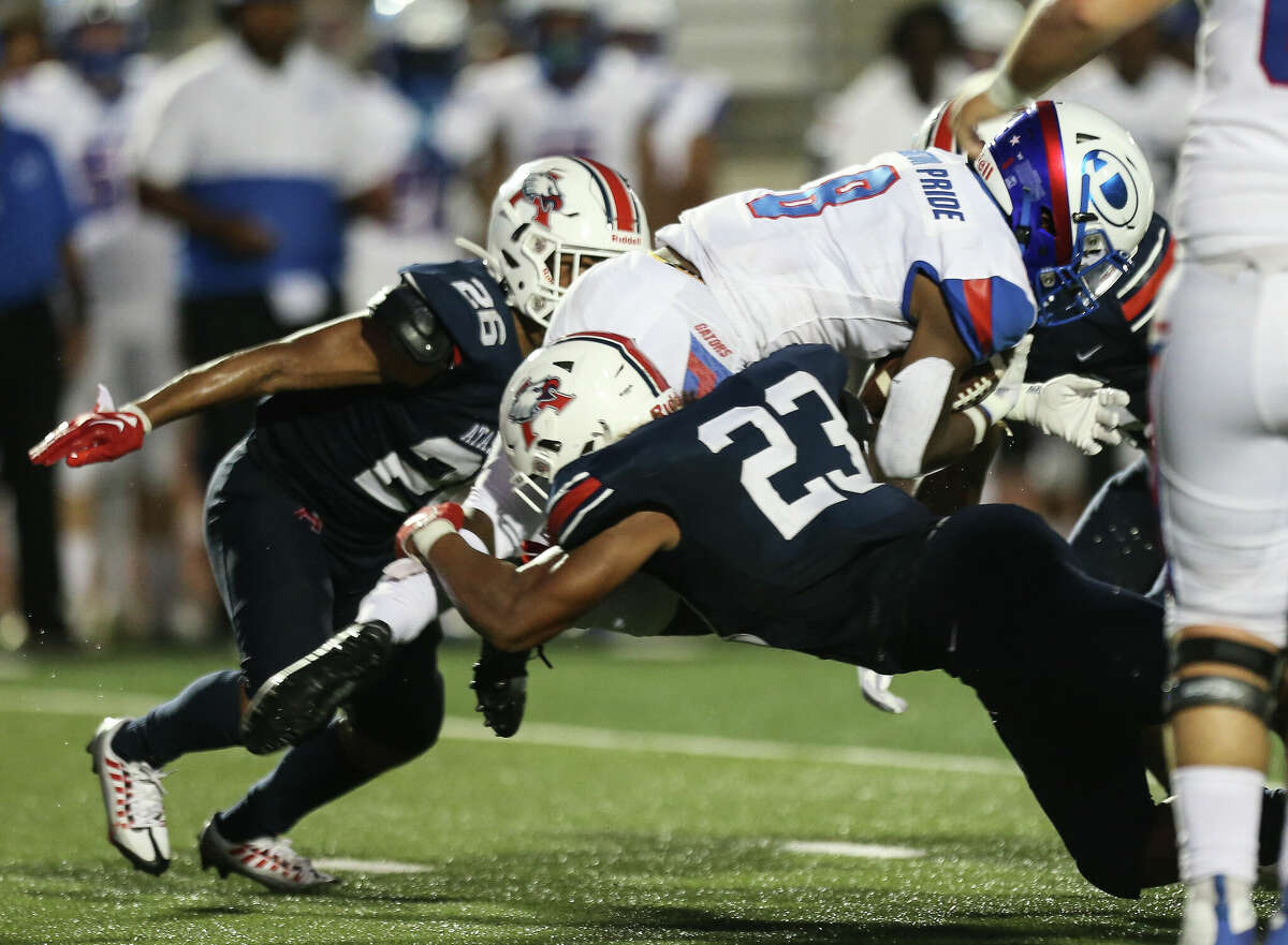 Atascocita line backer Jadon Ducos (23) tackles Dickinson running back Malachi McNair during the second quarter of a non-district game Thursday, Aug. 25, 2022, at Turner Stadium in Humble.