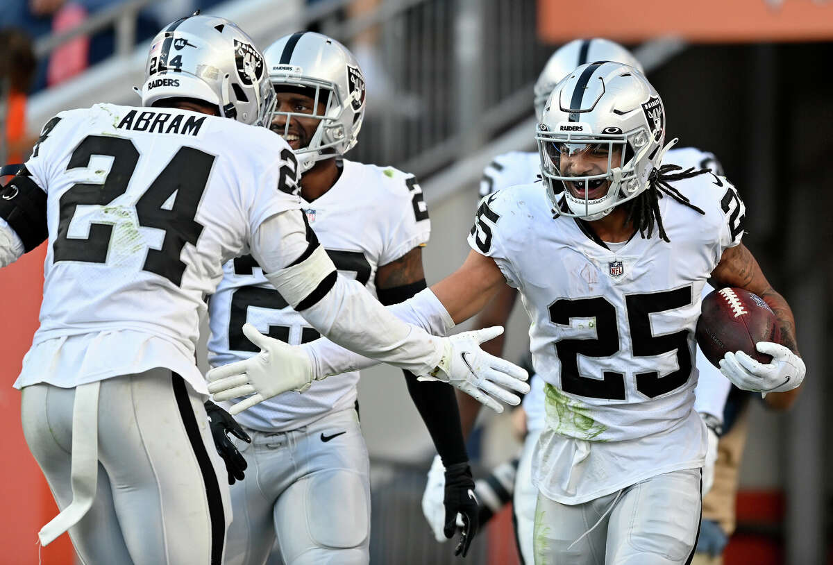 Trevon Moehrig #25 of the Las Vegas Raiders celebrates after making an interception against the Denver Broncos during the fourth quarter at Empower Field At Mile High on October 17, 2021 in Denver, Colorado. (Photo by Dustin Bradford/Getty Images)