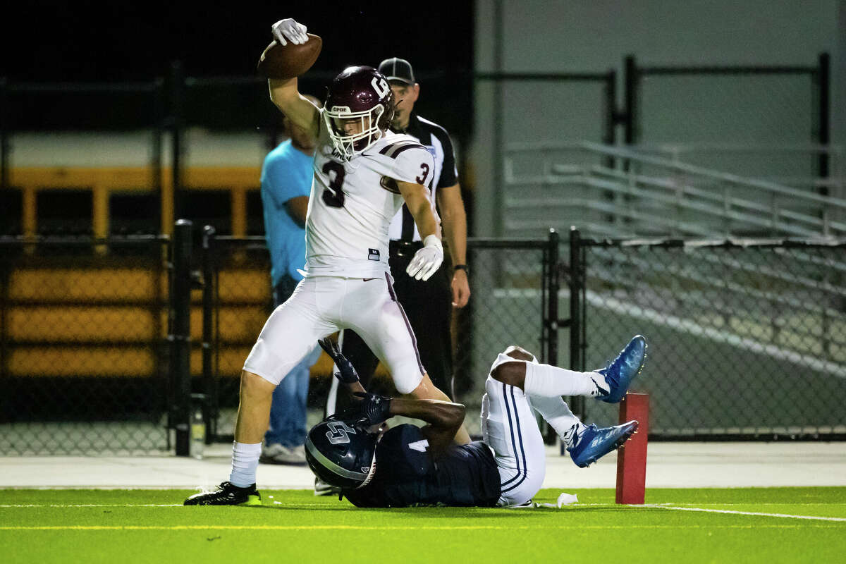 Cinco Ranch receiver Seth Salverino (3) makes a one handed catch along the sideline for a touchdown over College Park defensive back Andrew Powdrell (4) during the second half of a high school football game Thursday, Aug 25, 2022, in Shenandoah.