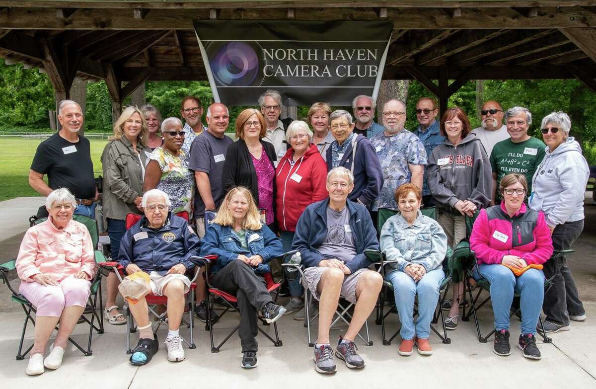 Members of the North Haven Camera Club celebrated their 10th anniversary at the end-of-season get-together. Pictured are members of the Executive Board, from left, including Laura Parisi, Vice president, Scott Jezierny Treasurer, Joe Whitmore President, Darlene Whitmore Publicity. Missing are Simmie Reagor Secretary, Bill Rothfuss Competition Director, Faye Dudek Membership, and Joanne Hiscocks Field trips.