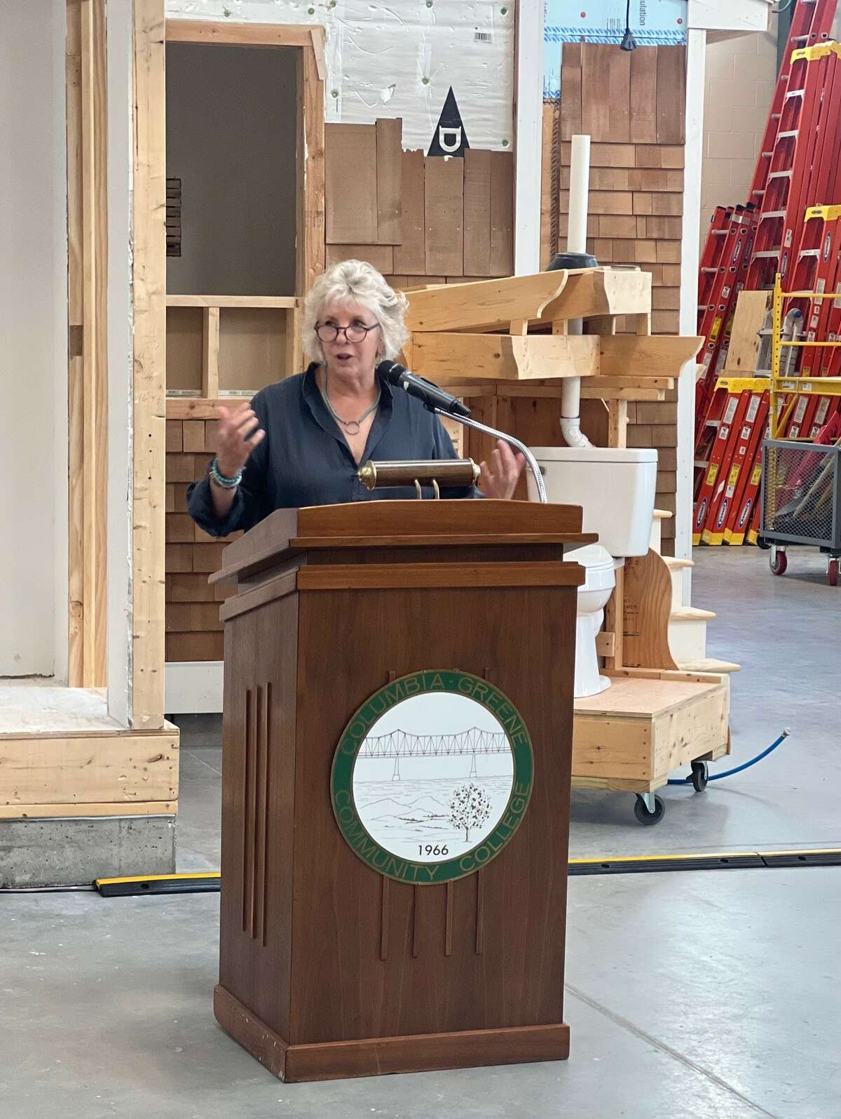 Assemblywoman Didi Barrett speaks at Columbia-Greene Community College after securing a grant for the institution that will allow it to expand a popular construction program.