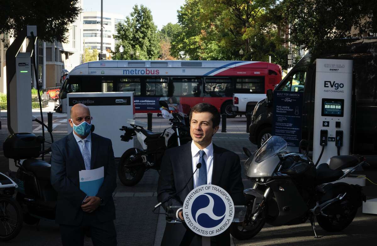 U.S. Secretary of Transportation Pete Buttigieg speaks during an event outside of the Department of Transportation in October 2021.