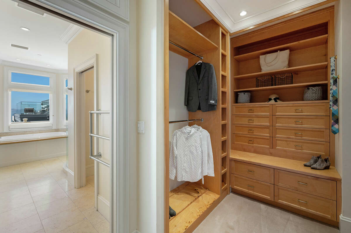 A spacious closet adjacent to one of the home's six bedrooms.