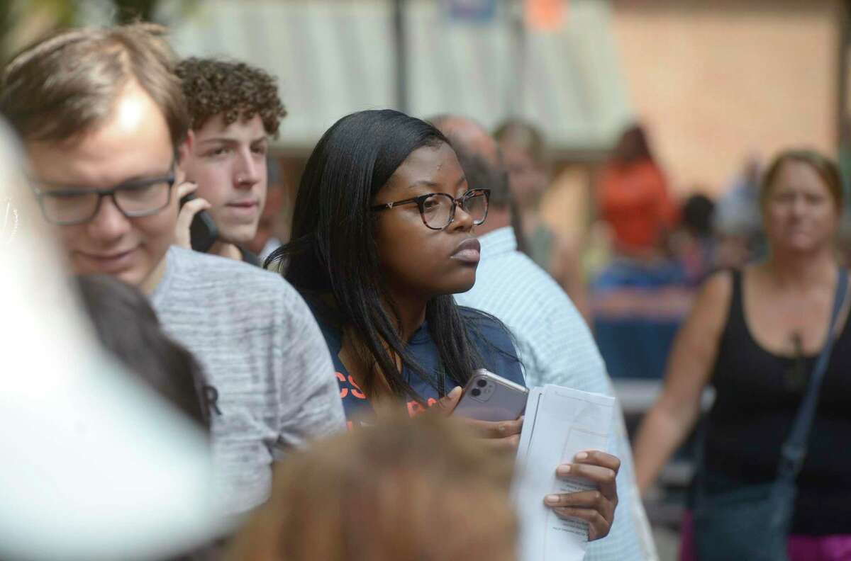 Janaija Bentley, of New Haven, waits in the check-in line during Western Connecticut State University freshman move-in-day on the Midtown campus. Friday, August 26, 2022, Danbury, Conn.