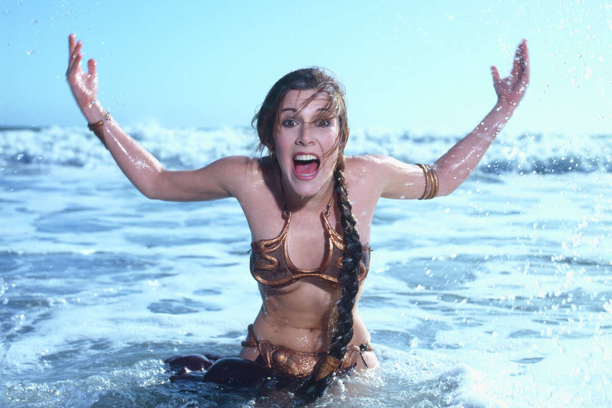 Carrie Fisher in her famed "Return of the Jedi" bikini on the beach Golden Gate National Recreation Area, Calif.
