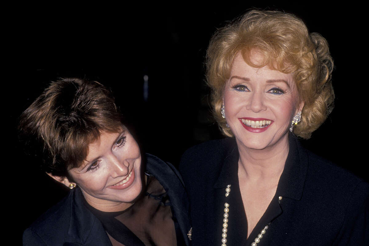 Carrie Fisher and Debbie Reynolds attend "The Unsinkable Molly Brown" Opening on September 19, 1989 at the Pantages Theater in Hollywood, California.