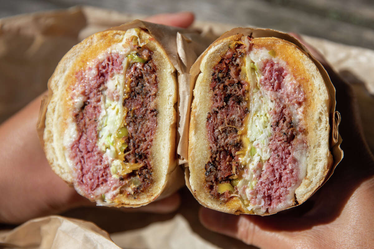 The Allison, with pastrami and roast beef, is one of the signature sandwiches at Deli Board in San Francisco, Calif. on Aug. 19, 2022.