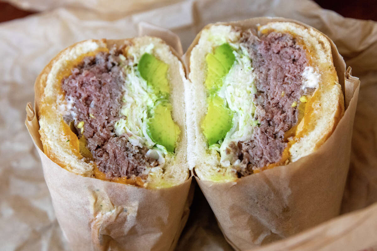 The Ron, with roast beef, cheddar cheese, jalapenos, cole slaw, and avocado is one of the signature sandwiches at Deli Board in San Francisco, Calif. on Aug. 19, 2022.