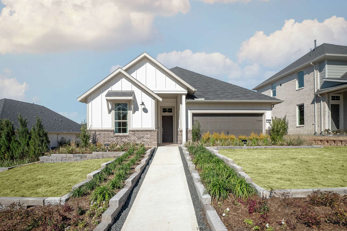 A model home on a 50-foot-wide lot in Westridge Cove, Conroe,a new community under construction from Tri Pointe Homes.