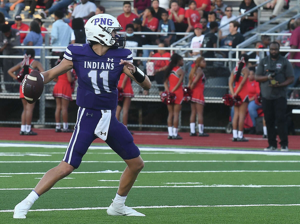 Port Neches-Groves' Cole Crippen looks for an open receiver against Port Arthur Memorial during their season opener Friday. Photo made Friday, August 26, 2022 Kim Brent/Beaumont Enterprise