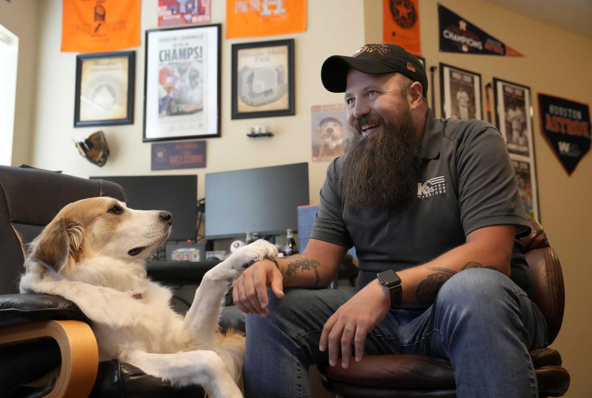 Smith: How a veteran with PTSD found life-saving dog, love for Astros.