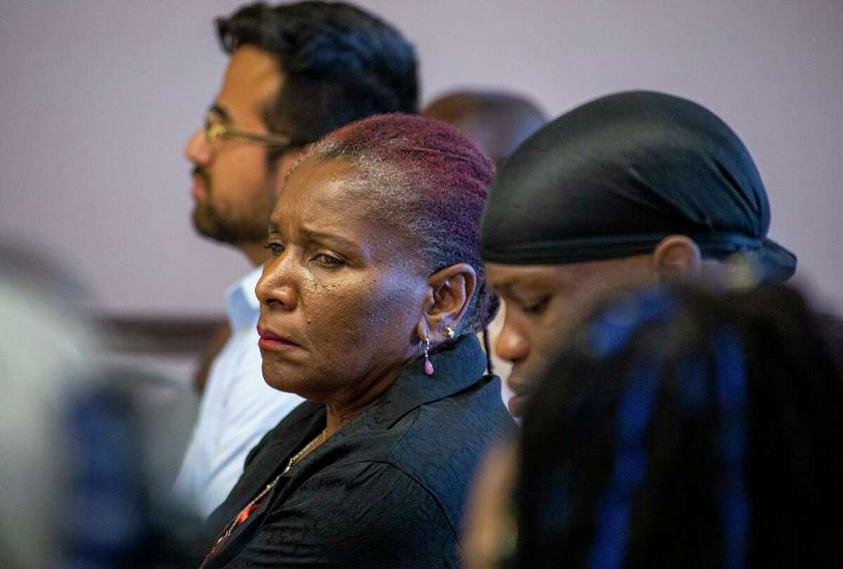 Rasheedah Blake, director of youth housing operations for Rainbow Community Center of Contra Costa County, listens to an attendee speak at the Antioch Senior Center in Antioch.