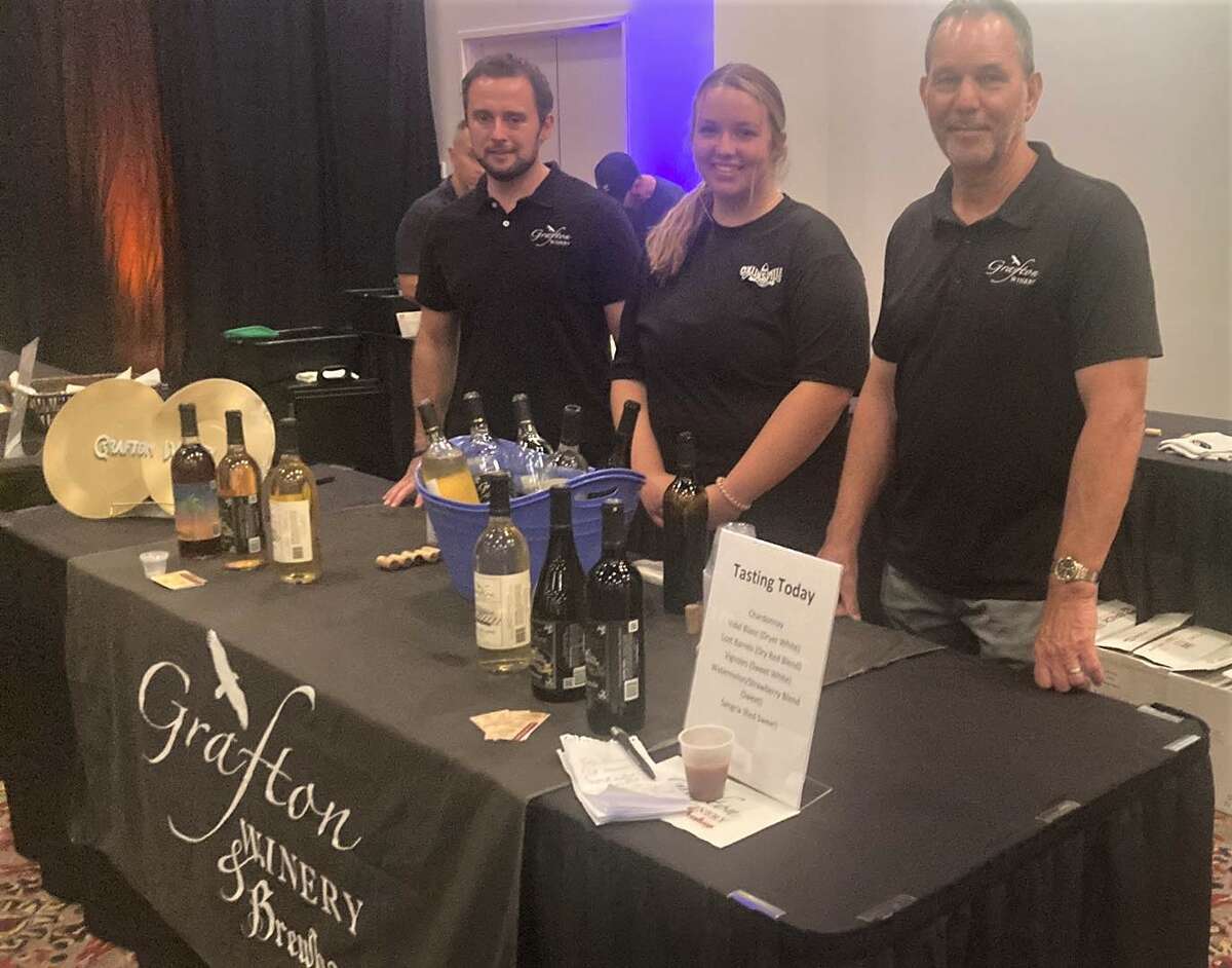 Grafton Winery and Brewhaus represents Jersey County at the American Cancer Society Metro East tasting event, Farm To Table, held Aug. 25 at the Gateway Convention Center in Collinsville. Regularly offering support for the annual event are, left to right, Jameson Dehner, general manager of Grafton Winery, Alyssa Gerstenecker with the Gateway Convention Cennter, and Mike Nikonovich, co-owner/co-founder of Grafton Winery and Brewhaus, 300 W Main St., Grafton.