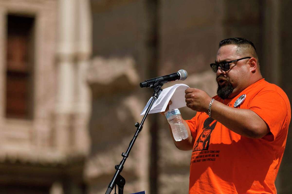 Javier Cazares, father of 9-year-old Jackie Cazares, reads a speech during the Raise Our Voices to Raise the Age March for Our Lives Rally at the Texas State Capitol in Austin, Texas, Saturday, Aug. 27, 2022. Jackie was one of 19 fourth-graders and two teachers who were killed in a school shooting at Robb Elementary in Uvalde, Texas, on May 24.