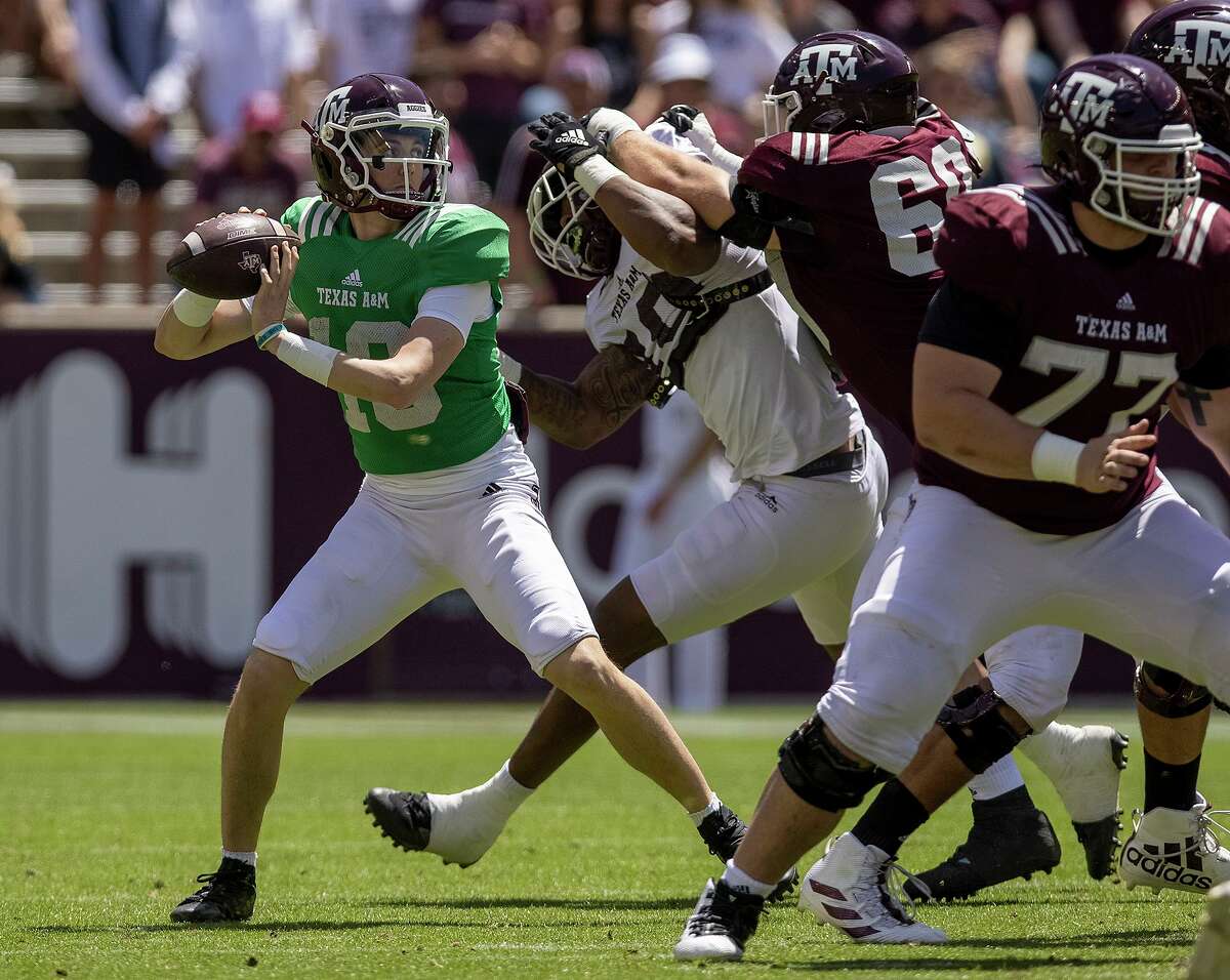 Texas A&M Maroon's Haynes King passes during the Texas A&M Maroon and White game at Kyle Field in College Station, Texas on Saturday, April 9, 2022. (Michael Miller/College Station Eagle via AP)
