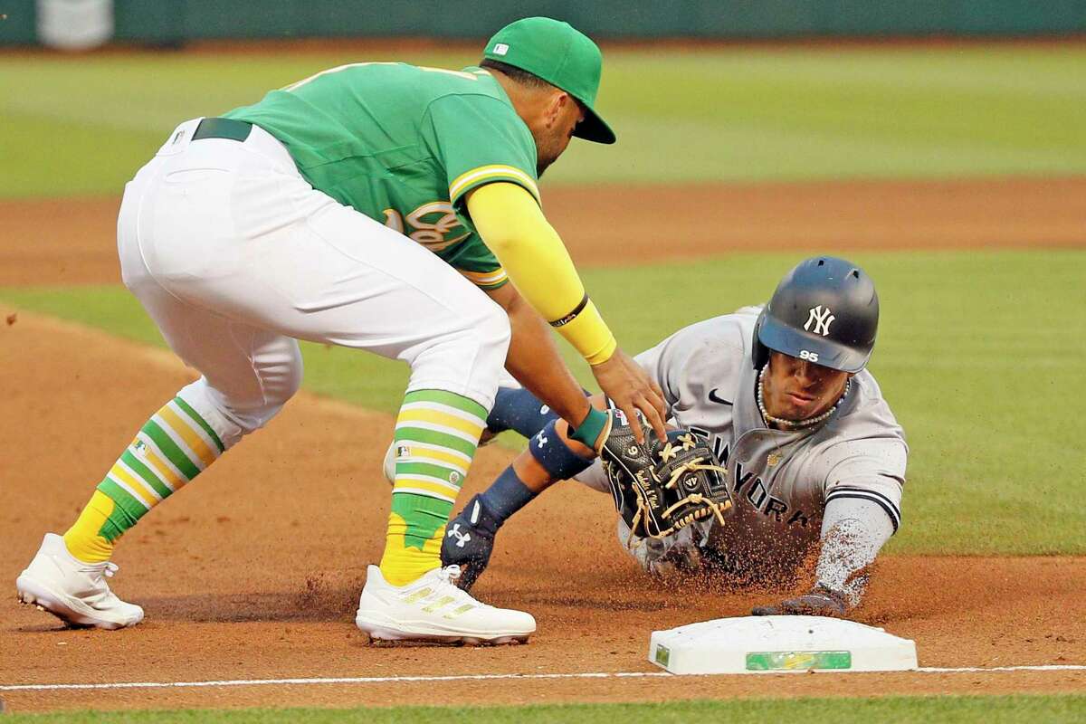 A's hold Yankees to 1 hit, win 3-2 in 11 on LeMahieu error