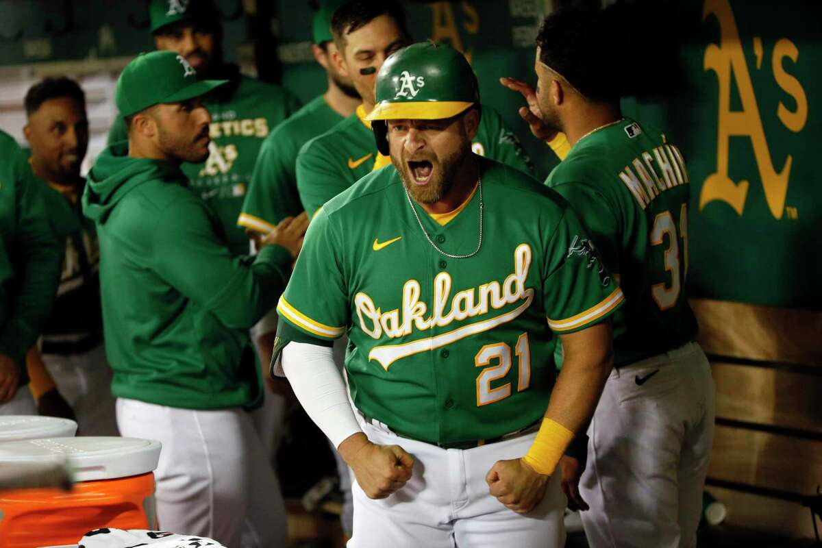 Oakland Athletics Stephen Vogt(21) after hitting a two-run homer to tie the MLB game in the tenth inning against the New York Yankees at RingCentral Coliseum in Oakland, Calif., Saturday, Aug. 27, 2022.