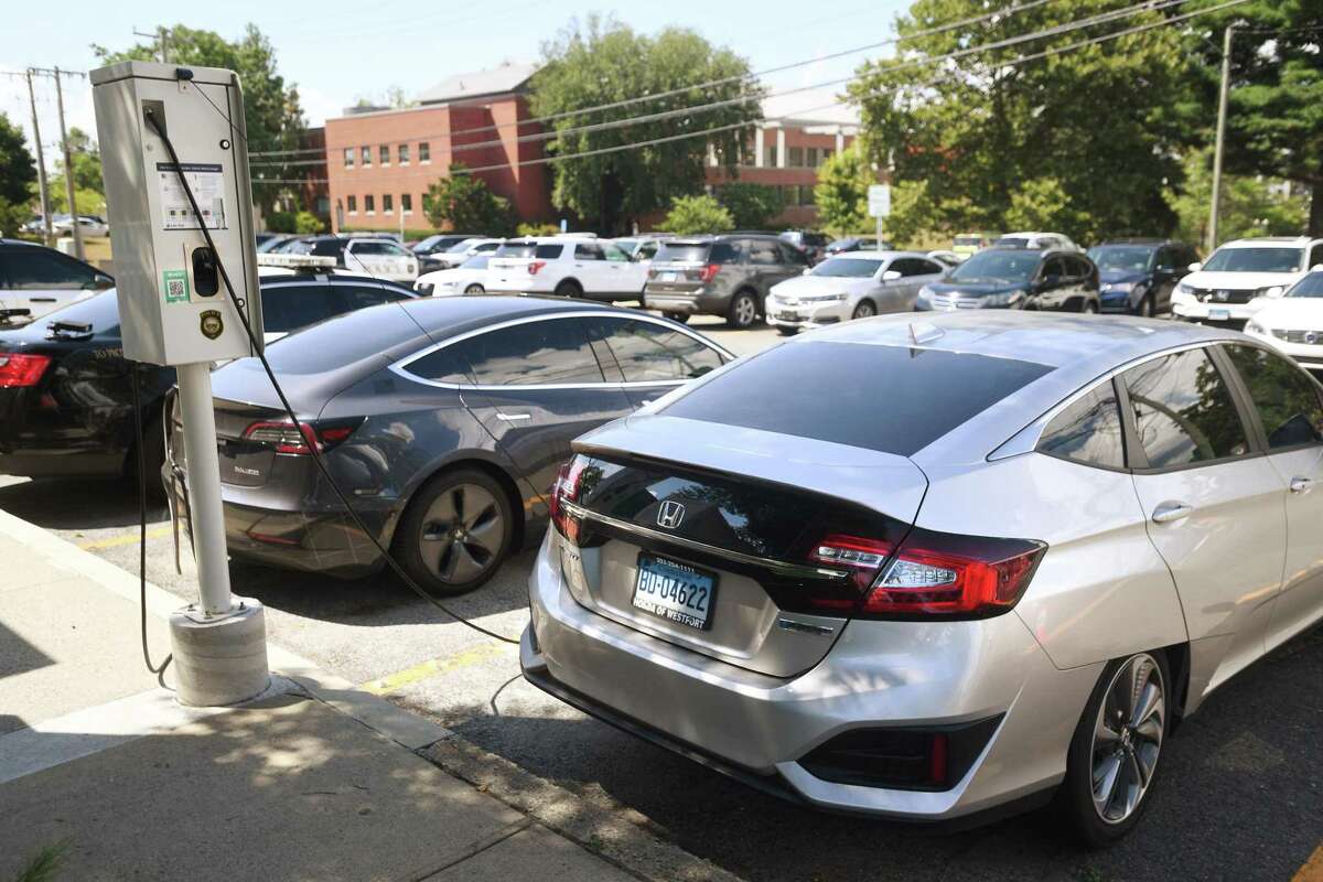 Electric police vehicles recharge outside the Wesport Police Department in Westport, Conn. on Tuesday, August 23, 2022.