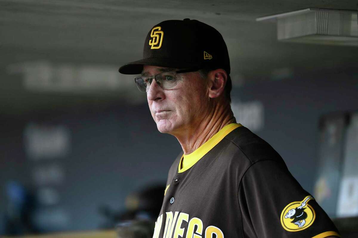 San Diego Padres manager Bob Melvin watches from the dugout before a baseball game against the Detroit Tigers, Monday, July 25, 2022, in Detroit. (AP Photo/Jose Juarez)