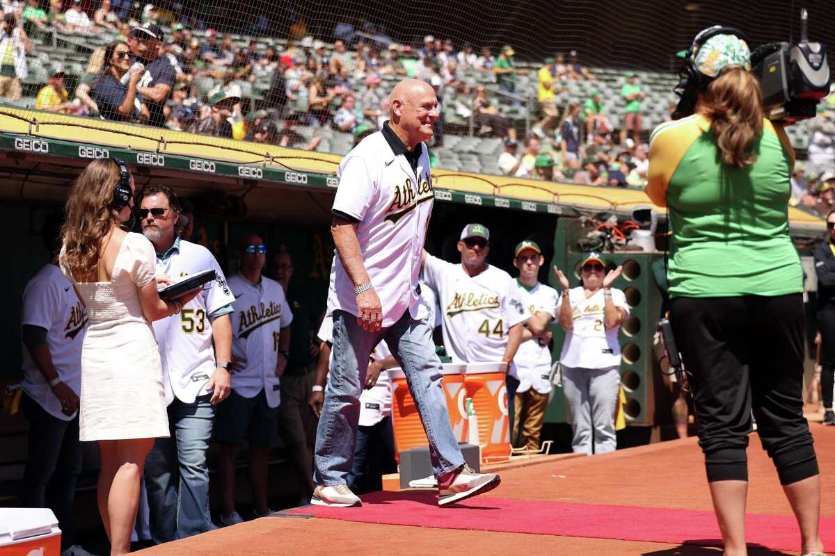 Oakland Athletics’ Art Howe is introduced during ceremony honoring 20 game win streak by 2002 A’s before MLB game at Oakland Coliseum in Oakland, Calif., on Sunday, August 28, 2022.