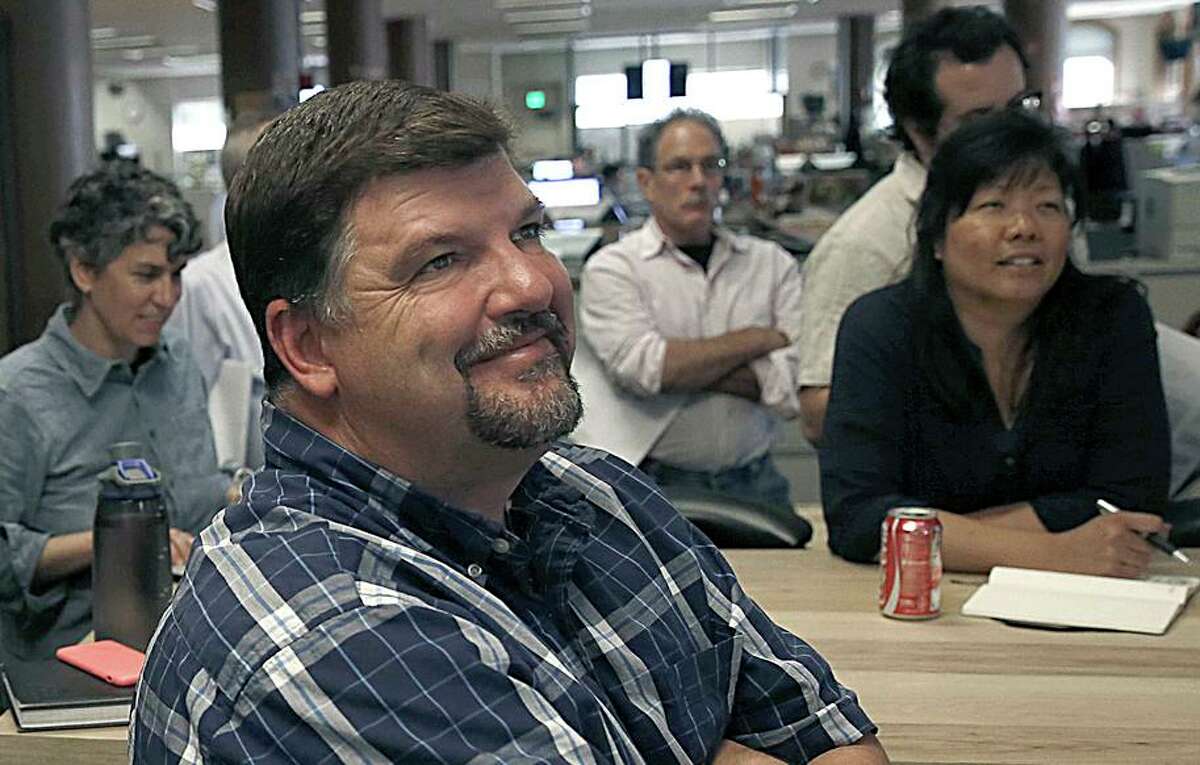 Al Saracevic, shown during a Chronicle meeting in July 2015, served as the paper’s sports editor for more than a decade.