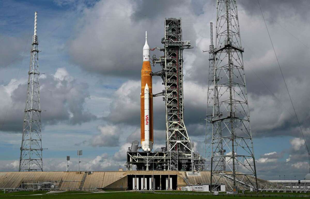 The Artemis I Orion capsule sits atop the Space Launch System (SLS) rocket on Launch Pad 39B.