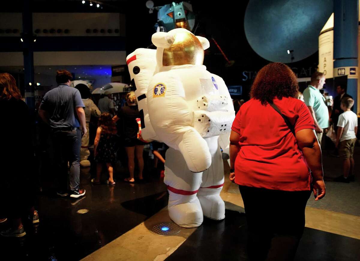 An inflated astronaut greets attendees at Space Center Houston for the Artemis I launch party on Monday, Aug. 29, 2022 in Houston. The launch was scrubbed and tentatively rescheduled for Sept. 2.