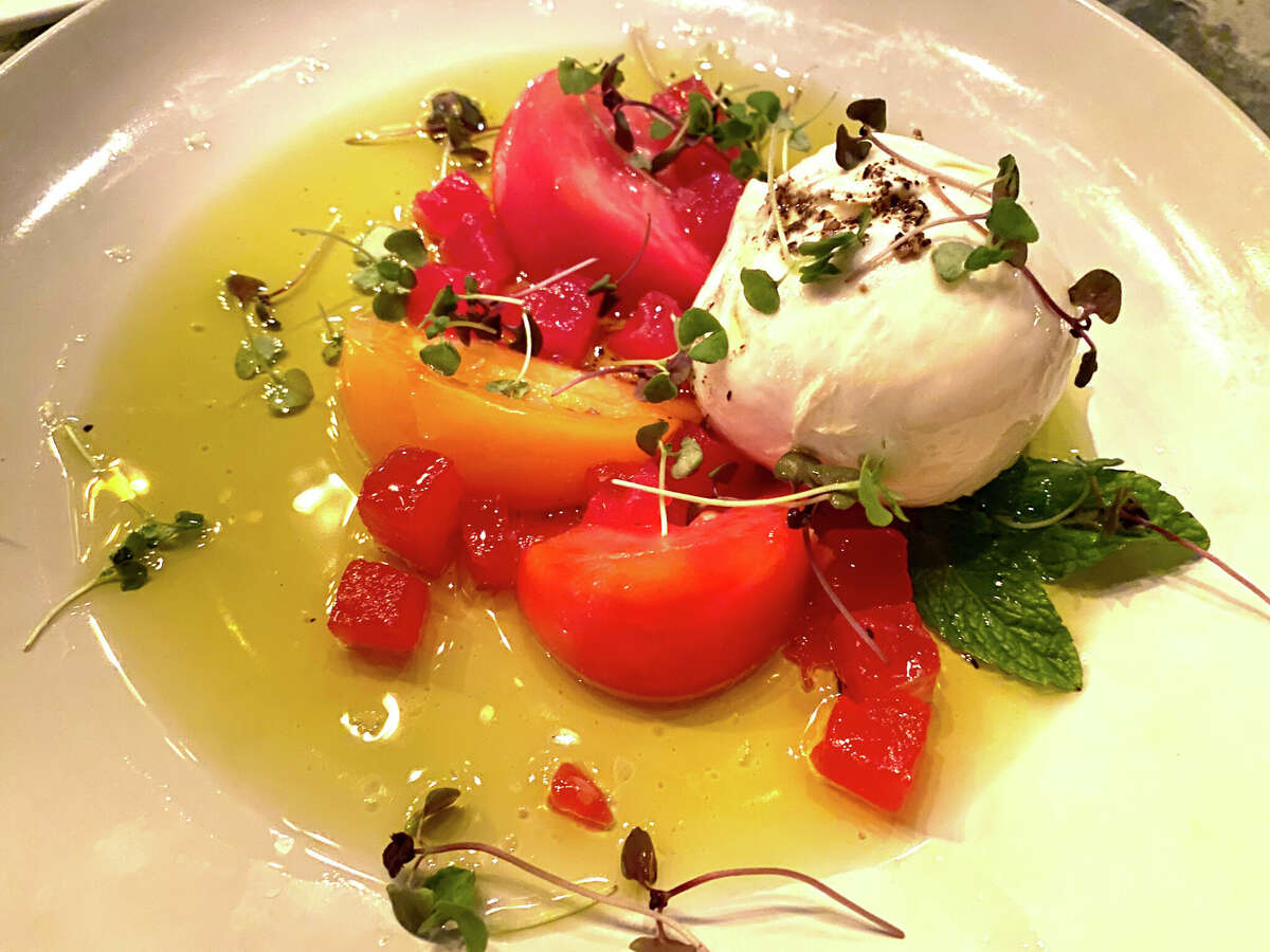 Burrata salad with tomato, comprressed watermelon and mint at Loda in Bolton Landing.