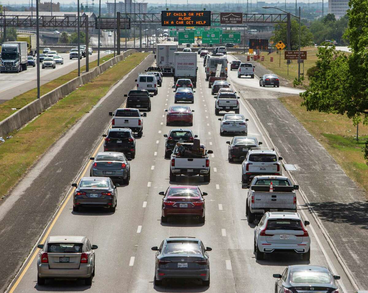 Cars travel Thursday, July 14, 2022 on I-35 north of downtown San Antonio. Texas recently released a plan to spend a record $85 billion over the next decade on hundreds of road projects - including about $2.5 billion in the San Antonio region.
