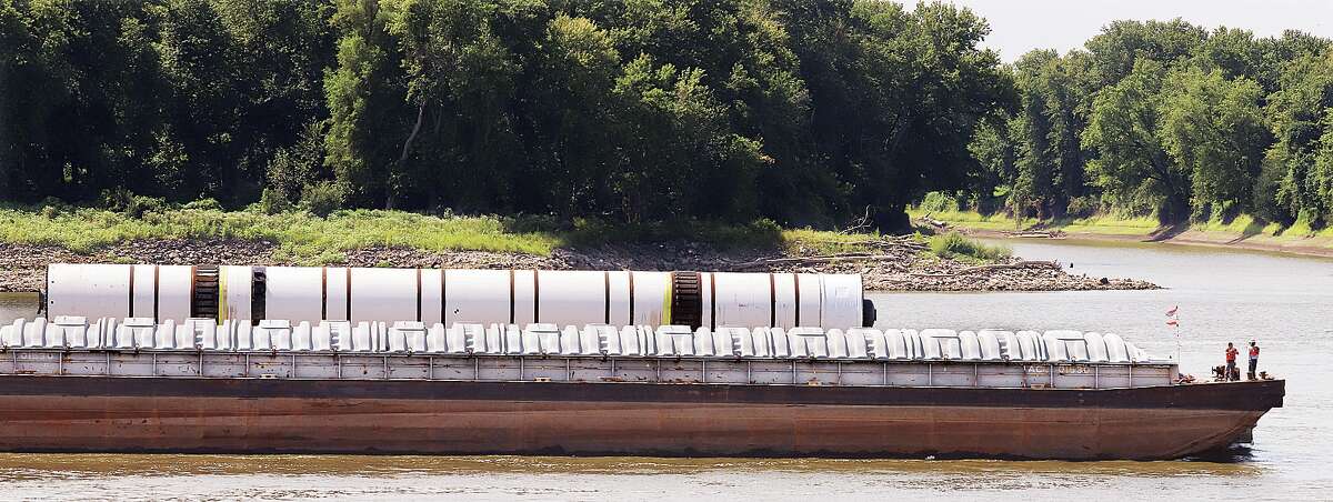 John Badman|The Telegraph It wasn't part of a moon rocket, but a rather large tube being transported up the Mississippi River Monday. The tube was seen preparing to lock through the Melvin Price Locks and Dam 26 with a crew from the towboat Kenny Eads waiting at the front towboat's barges.
