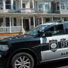 An Albany police cruiser drives down Hudson Avenue between Quail & Ontario on Monday, Aug. 29, 2022 in Albany, N.Y. A massive street party and large fight broke out early Sunday.