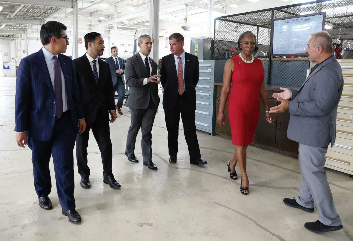 U.S. Secretary of Labor Marty Walsh (center) and Mayor Ron Nirenberg chat as they go on a tour of the St. Philip’s College’s Transportation and Manufacturing Technologies program with St. Philip’s College President Adena Williams Loston (second from right) and Alamo Colleges Chancellor Dr. Mike Flores (left) before taking part in a roundtable discussion on Monday, Aug. 29, 2022. The labor secretary was here to talk about the city's Ready to Work job training program which received $2.9 million in a grant from the Department of Labor. John Haral (far right), the program’s chair, provided information to the group along the tour.