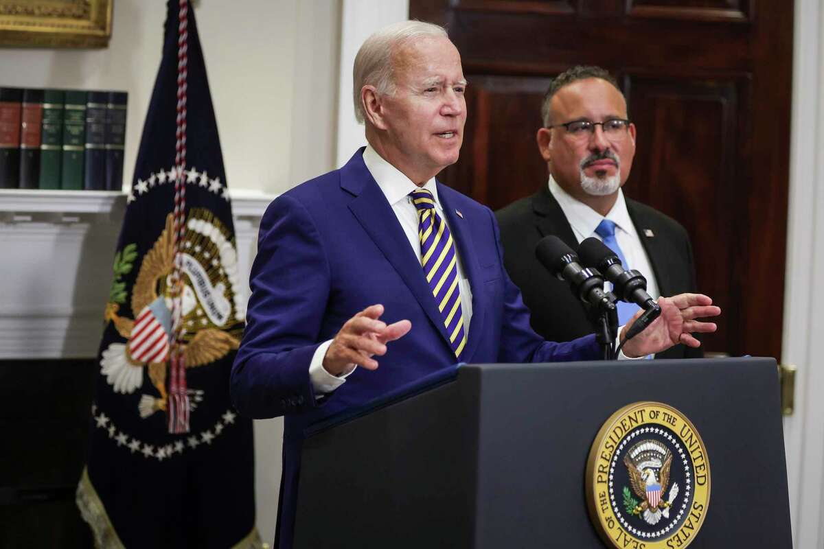 WASHINGTON, DC - AUGUST 24: U.S. President Joe Biden, joined by Education Secretary Miguel Cardona, speaks on student loan debt in the Roosevelt Room of the White House August 24, 2022 in Washington, DC. President Biden announced steps to forgive $10,000 in student loan debt for borrowers who make less than $125,000 per year and cap payments at 5 percent of monthly income. (Photo by Alex Wong/Getty Images)