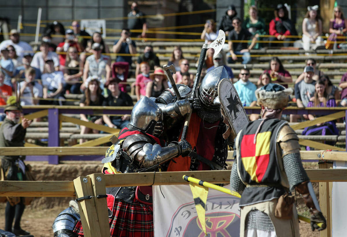 Two knights face off in armored combat in the arena Saturday, Nov. 21, 2020, at the Texas Renaissance Festival in Todd Mission, Texas.