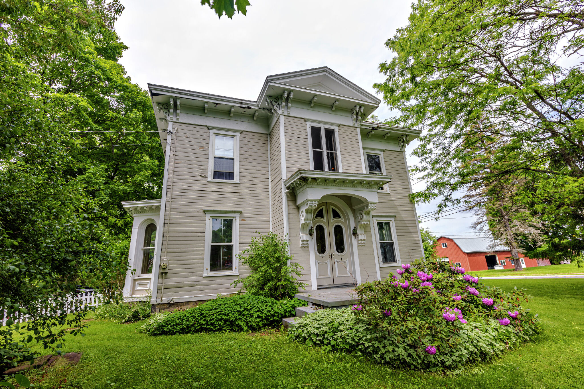 Delanson Colonial home for sale under $500,000 has five bedrooms, pool