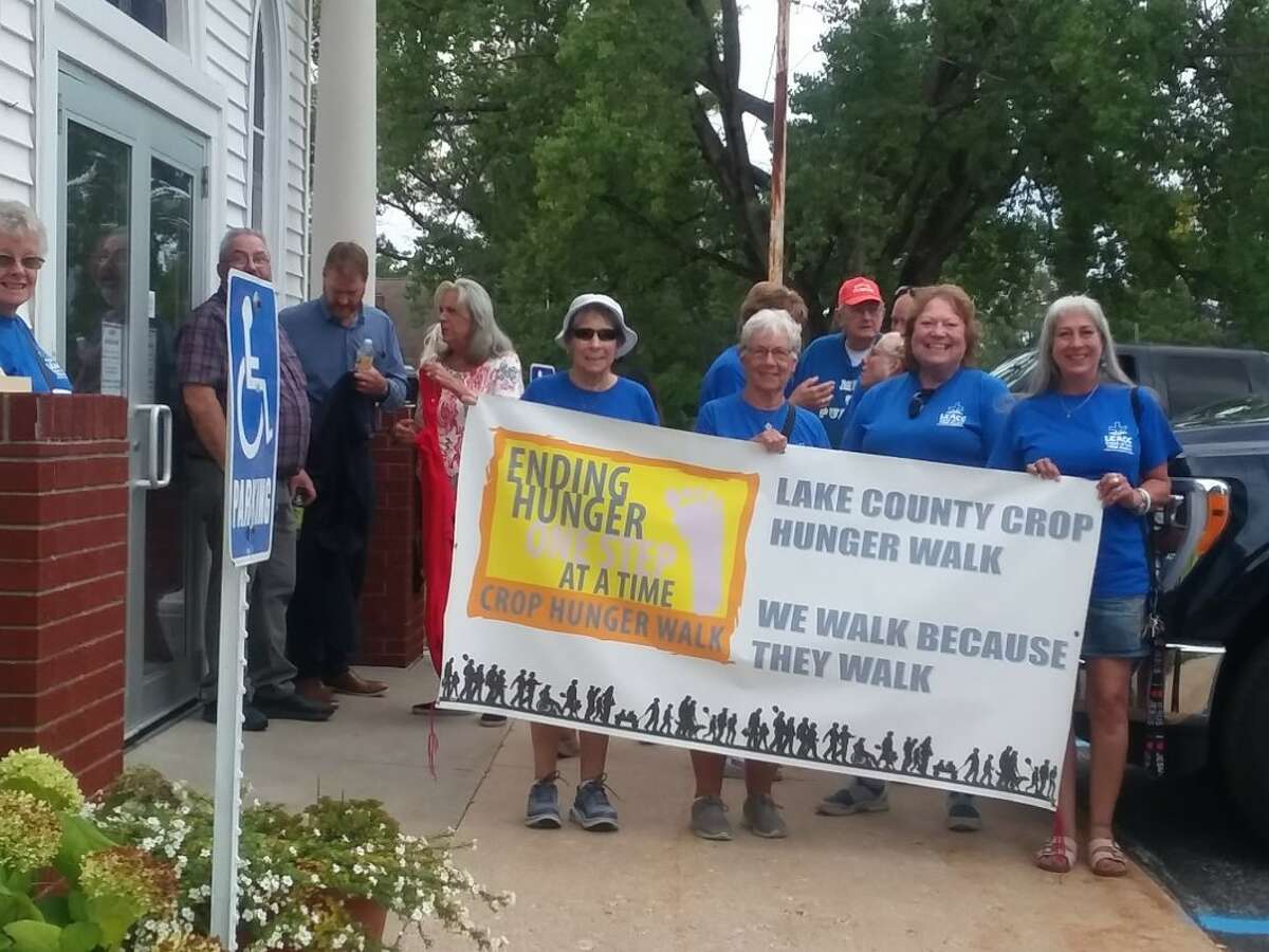 The 12th annual Lake County CROP Walk brought together over 300 people to walk for hunger, raising over $11,000. The Bread of Life Pantry team display the CROP Walk banner.