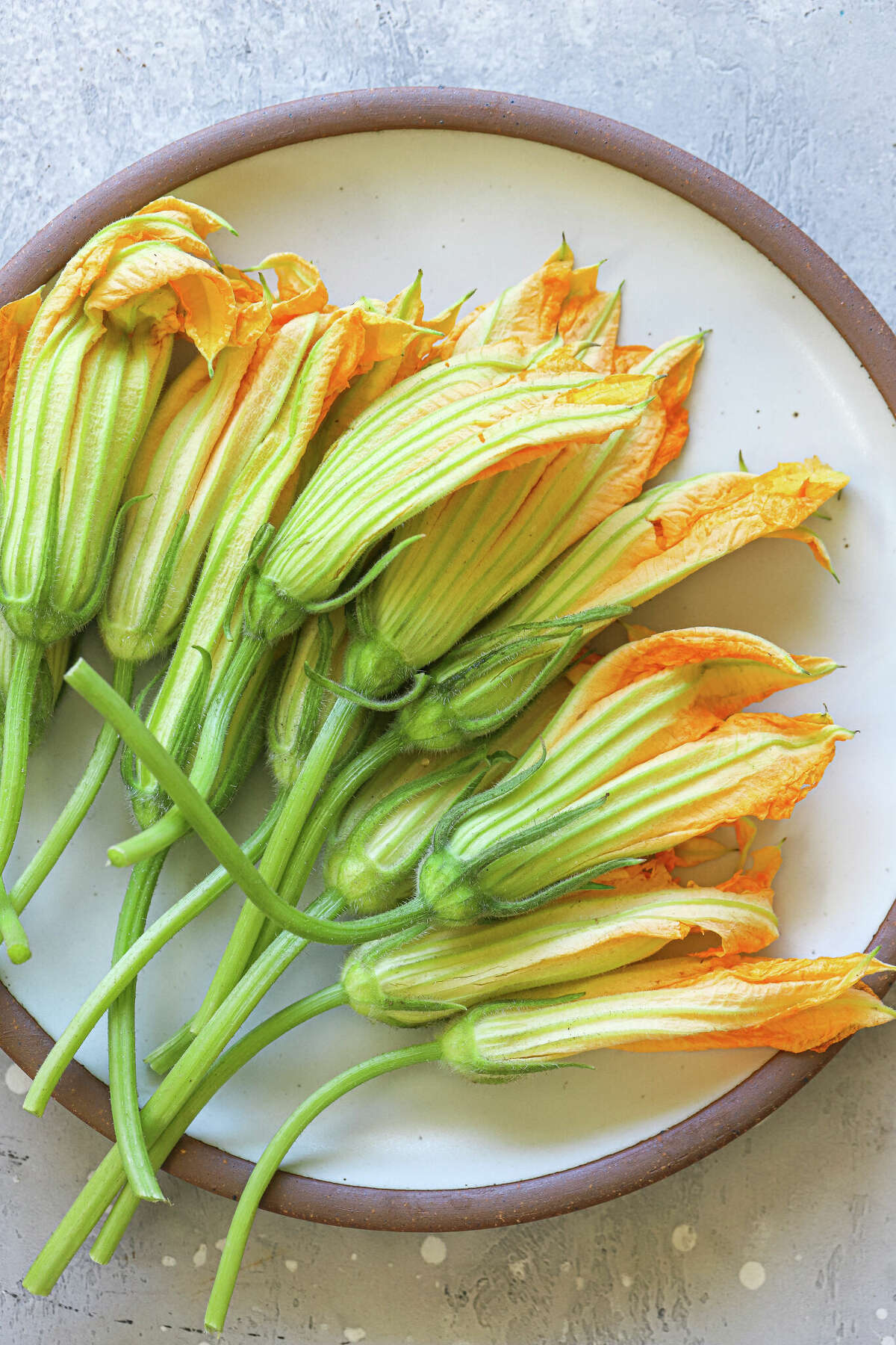 Fresh squash blossoms, cleaned and ready to fill. 