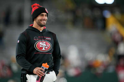 San Francisco 49ers #10 quarterback Jimmy Garoppolo warms up the